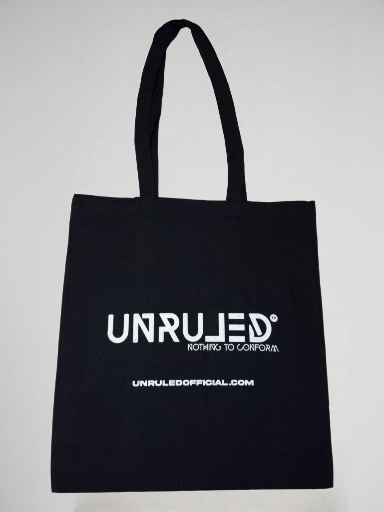 UNRULED eco-friendly reusable shopper bag featuring minimalist branded design.