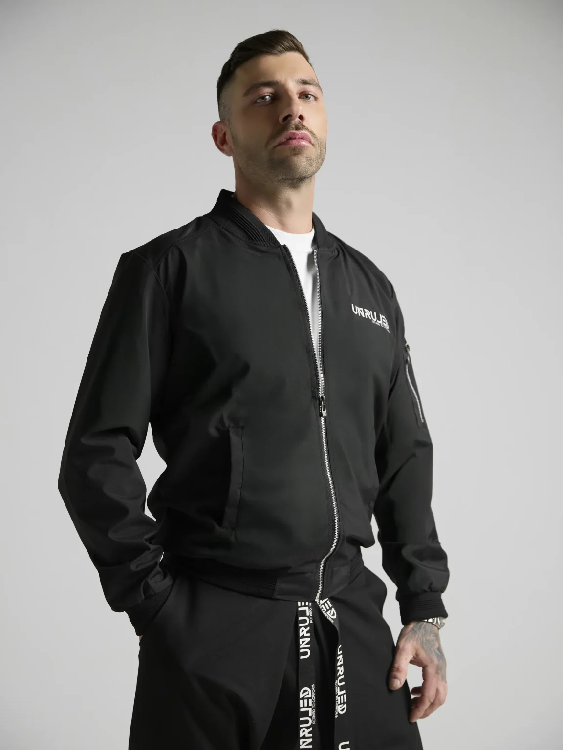 Statement bomber jacket with artistic graphics and contemporary streetwear design.