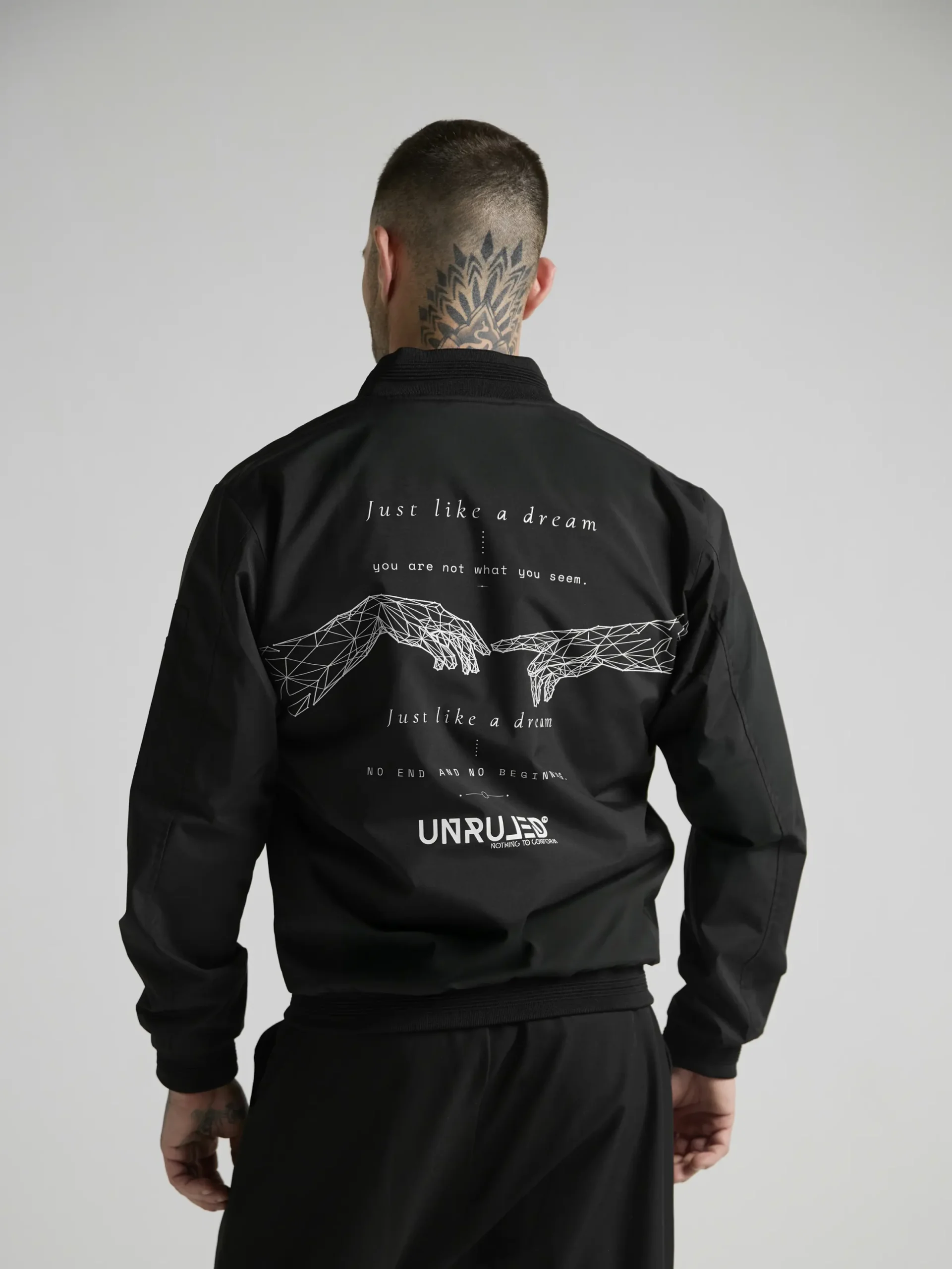 Statement bomber jacket with artistic graphics and contemporary streetwear design.