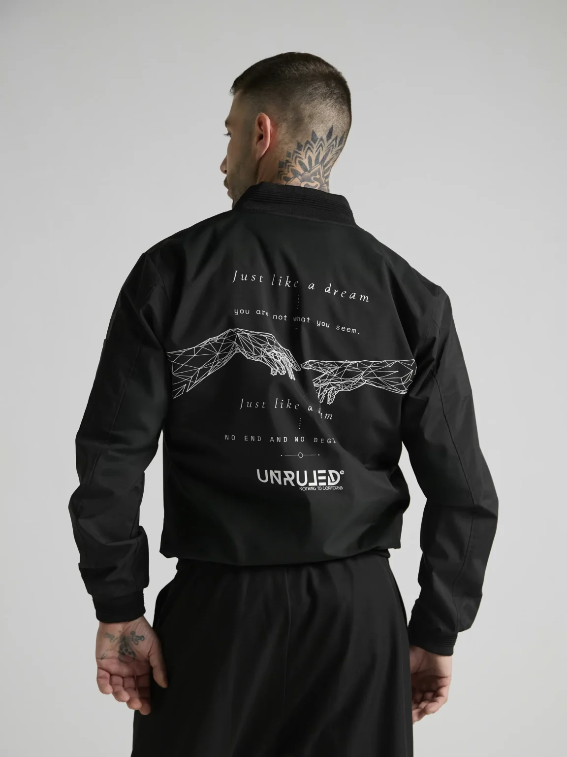 Statement bomber jacket with artistic graphics and contemporary streetwear design.