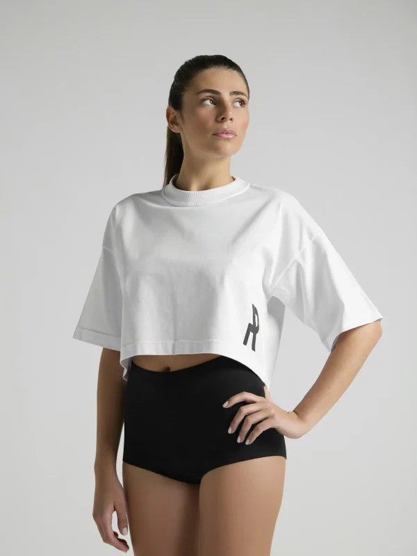 UNRULED white cropped t-shirt for women with clean and versatile styling.