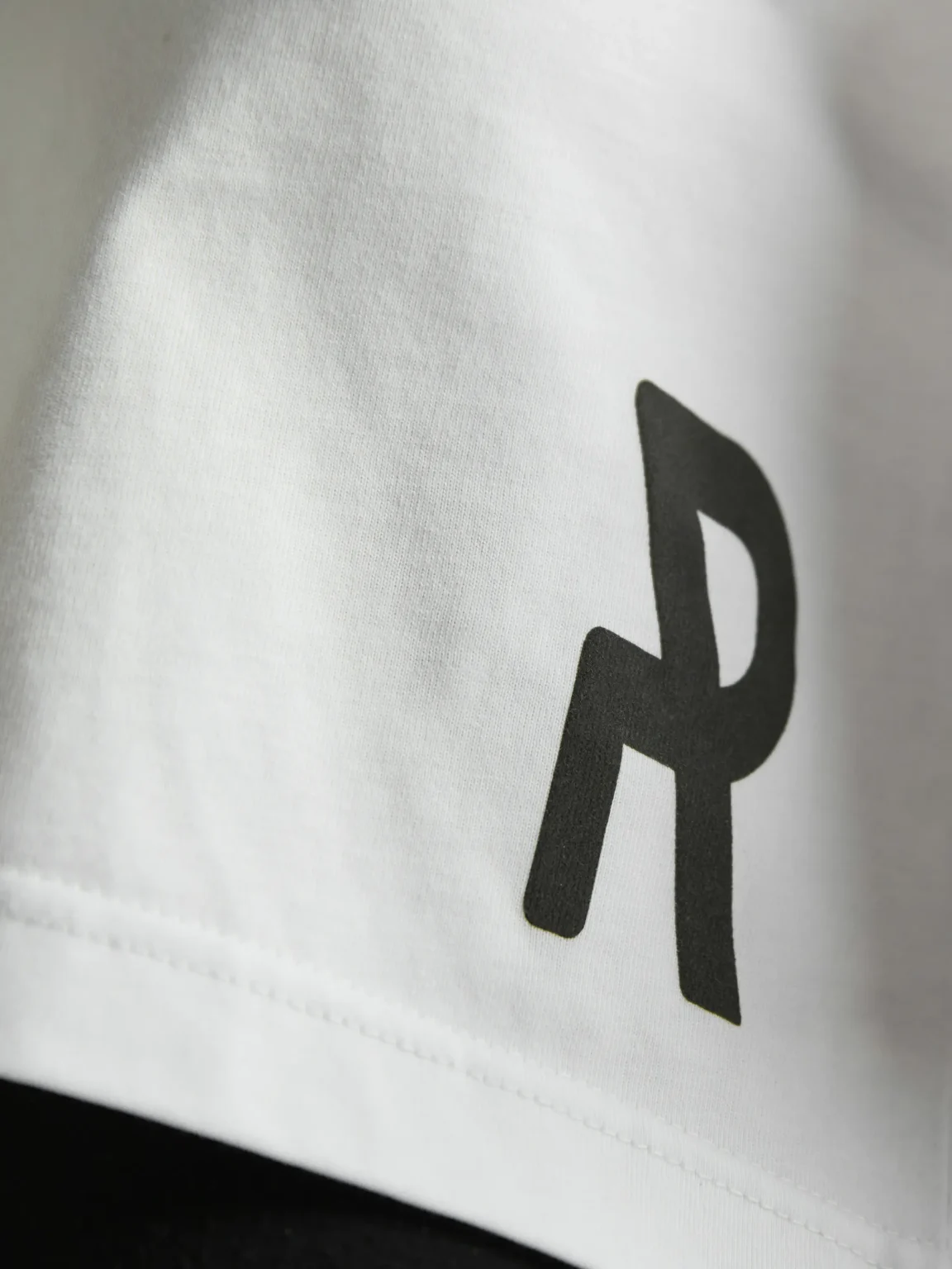 White cropped top for women by UNRULED featuring a modern streetwear fit.