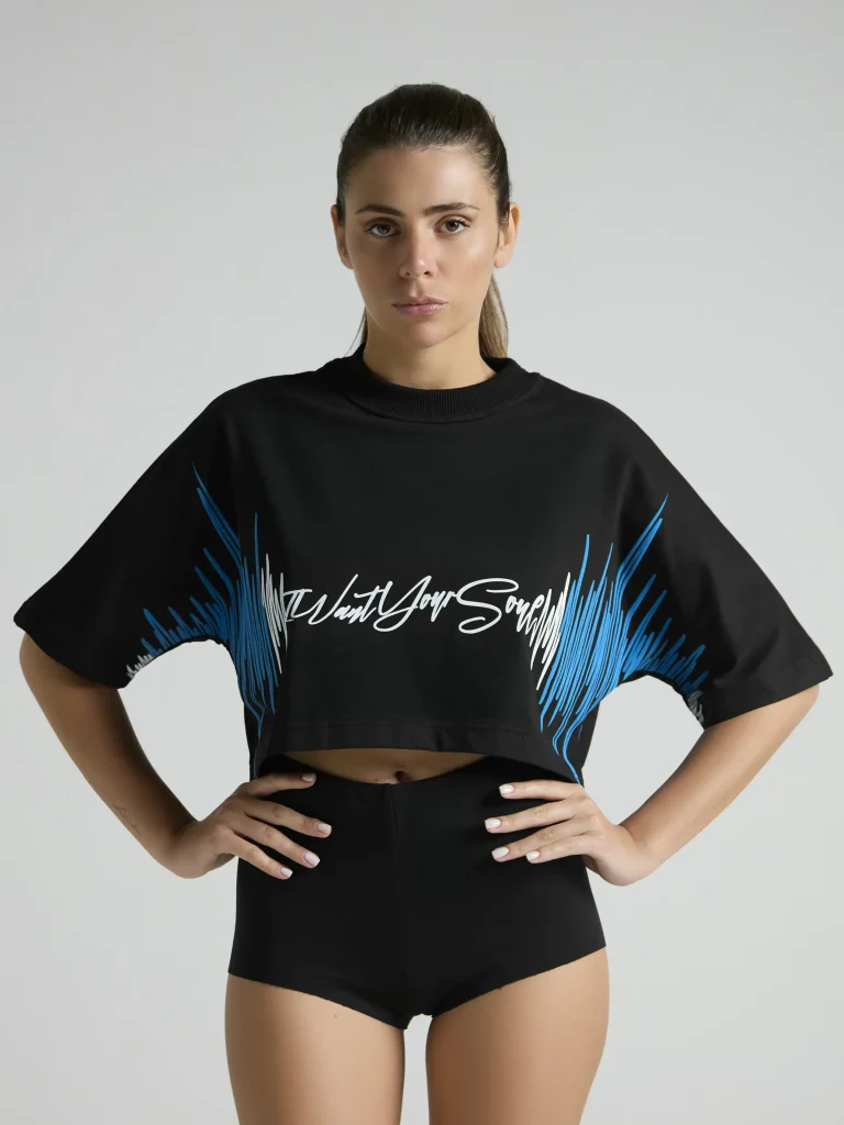 Black women's cropped T-shirt from UNRULED BEAT collection with immersive DJ-inspired artwork.