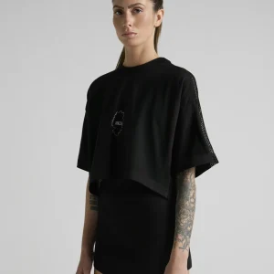 Women's black crop top with mesh inserts on shoulders and sides by UNRULED IBIZA collection.