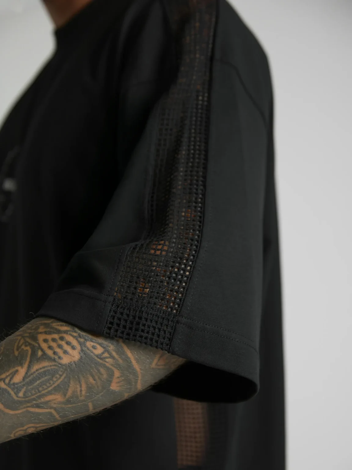 Premium men's T-shirt with mesh inserts on sleeves and sides from UNRULED IBIZA collection.