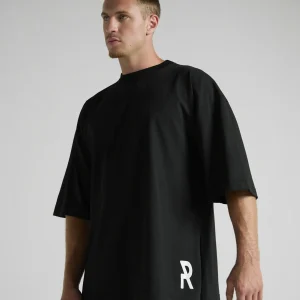 en's black oversized T-shirt from the UNRULED INSIDE Collection.