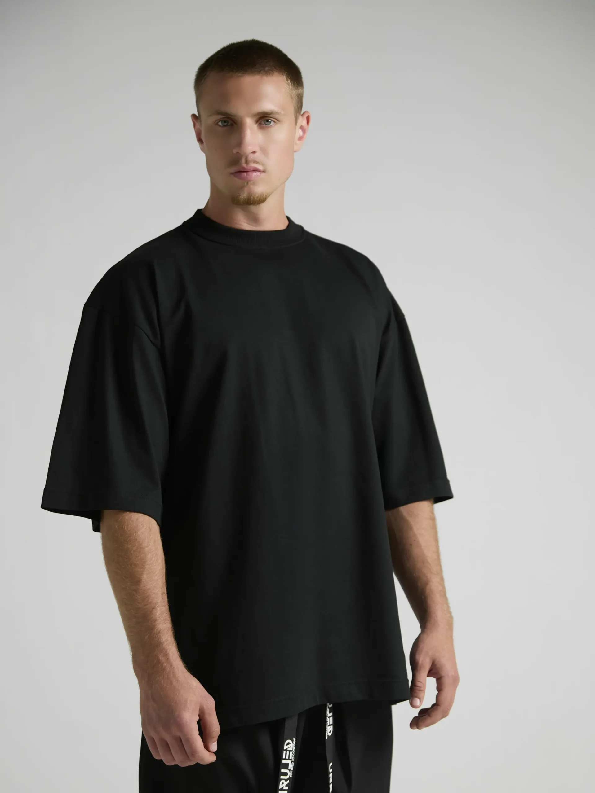 Contemporary black oversized T-shirt designed and handcrafted in Italy by UNRULED.