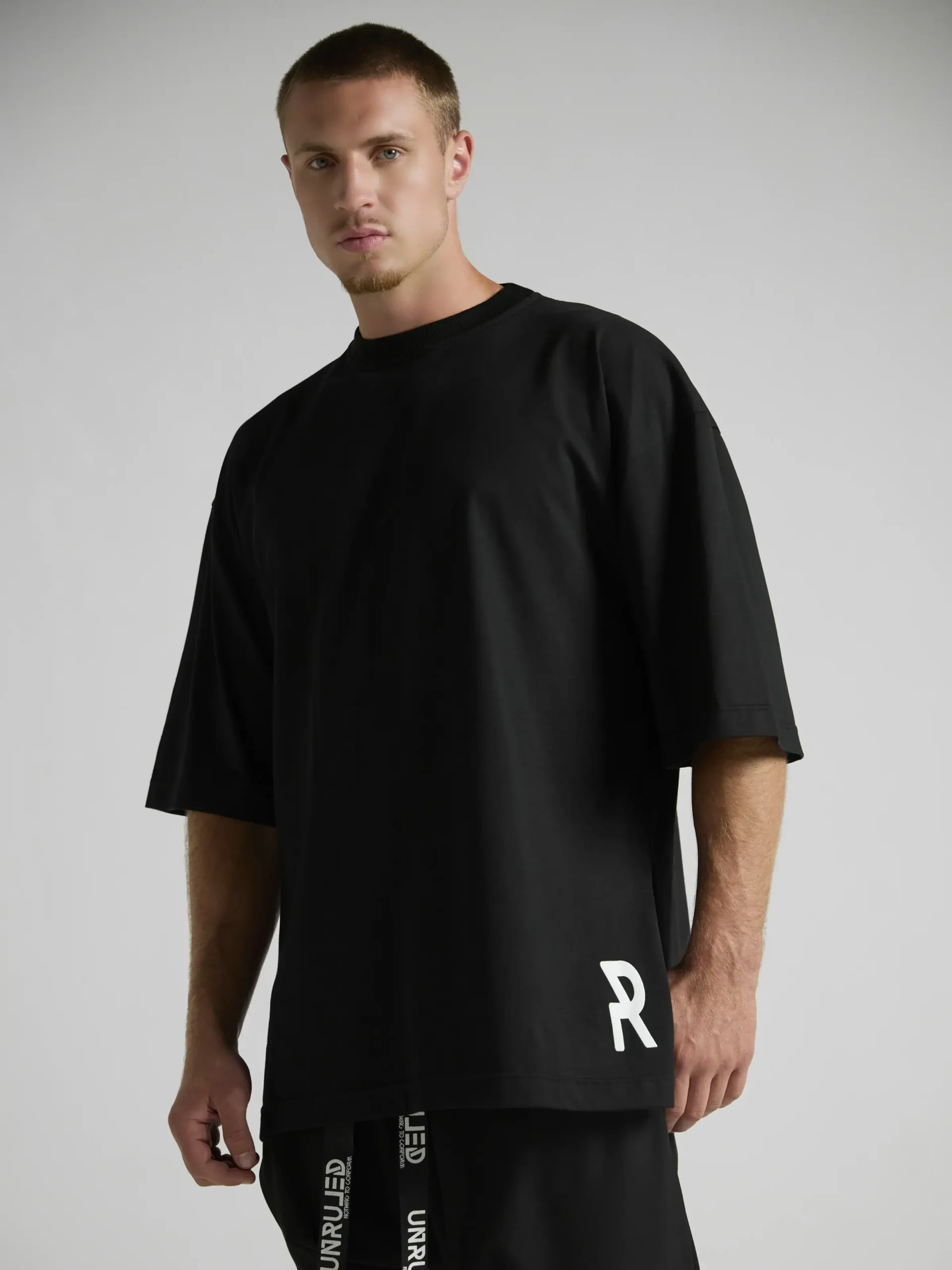 Contemporary black oversized T-shirt designed and handcrafted in Italy by UNRULED.