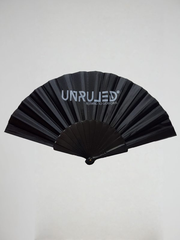 UNRULED folding fan featuring minimalist contemporary design and premium craftsmanship.