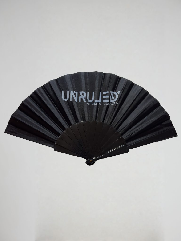 UNRULED folding fan featuring minimalist contemporary design and premium craftsmanship.